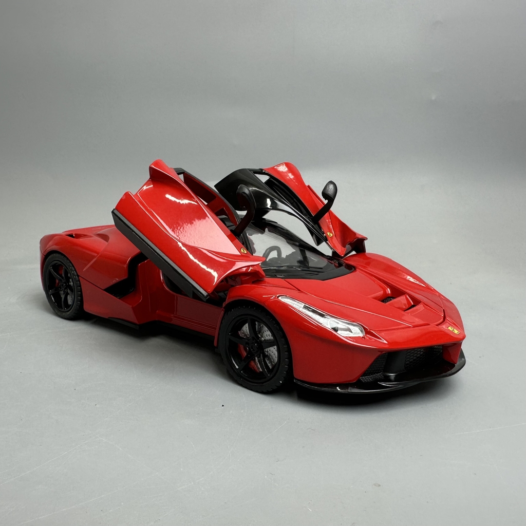 Mô Hình xe laferari đỏ tỉ lệ 1:22 Hợp kim có thể mở cửa - bánh sau chạy cót - Dài 21cm - rộng 9cm - cao 5cm - nặng : 800gram - FULL BOX : box màu SKU : oto281 - K64-T3-S6