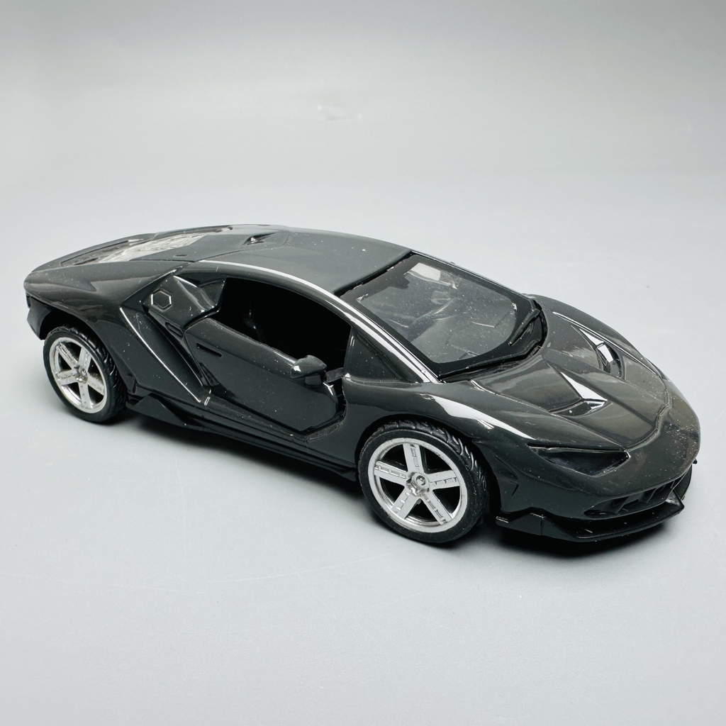 Mô Hình xe lambor đen tỉ lệ 1:36 Hợp kim có thể mở cửa - bánh sau chạy cót - Dài 12cm - rộng 5.5cm - cao 3cm nặng : 200gram - FULL BOX : box màu SKU : oto183 - K63-T1-S9
