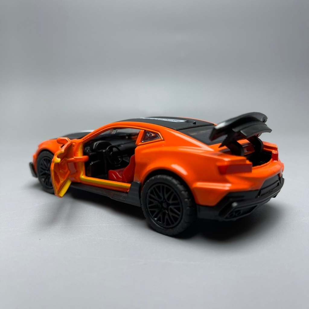 Mô Hình xe Chevrolet màu cam tỉ lệ 1:36 Hợp kim có thể mở cửa - bánh sau chạy cót - Dài 12cm - rộng 5cm - cao 4cm nặng : 200gram - FULL BOX : box màu - K64-T1-S2