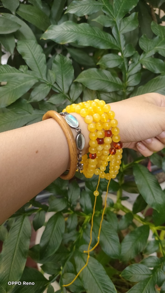 Chuỗi hổ phách mina màu vàng kem