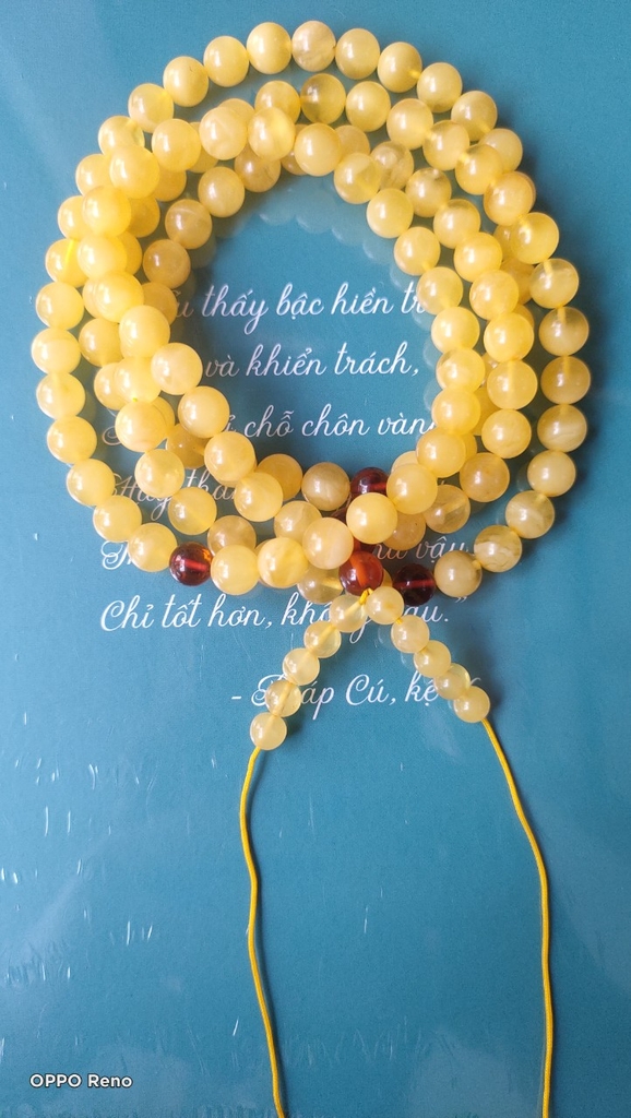 Chuỗi hổ phách mina màu vàng kem