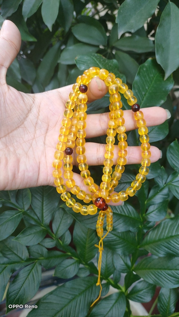 Chuỗi hổ phách mina màu vàng kem