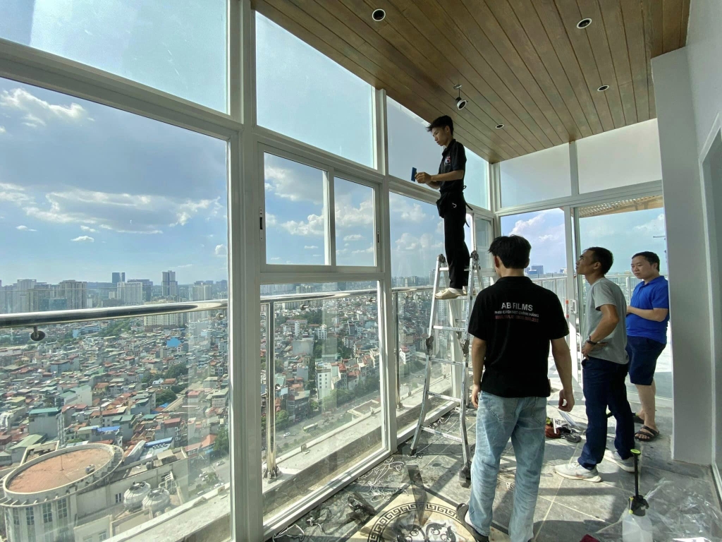 dán phim cách nhiệt cửa kính