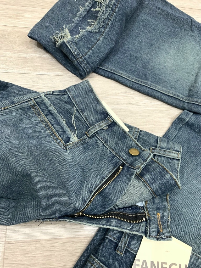 CHÂN VÁY BÒ NỮ DÀI TUA RUA SẴN (xả 75k)
