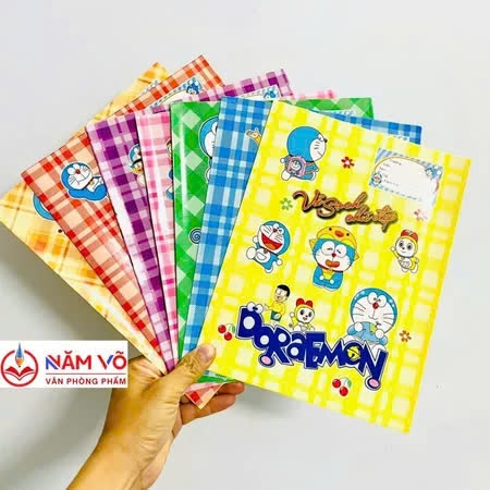 Bìa Kê Tập Doremon (Xanh Dương, Lá, Đỏ, Vàng, Tím, Hồng, Cam) (10 Tờ/Xấp) (10 Xấp/Bó)