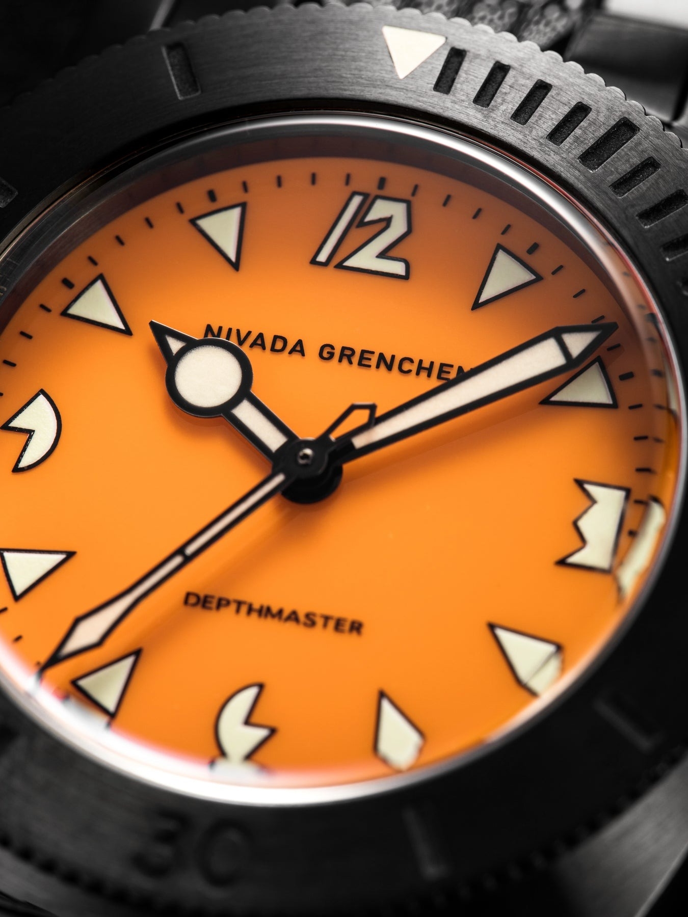 Nivada Grenchen, dòng sản phẩm Depthmaster, Ref number: 14131A, mặt số màu cam