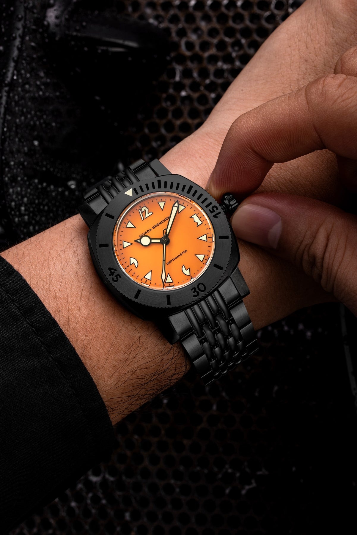 Nivada Grenchen, dòng sản phẩm Depthmaster, Ref number: 14131A, mặt số màu cam