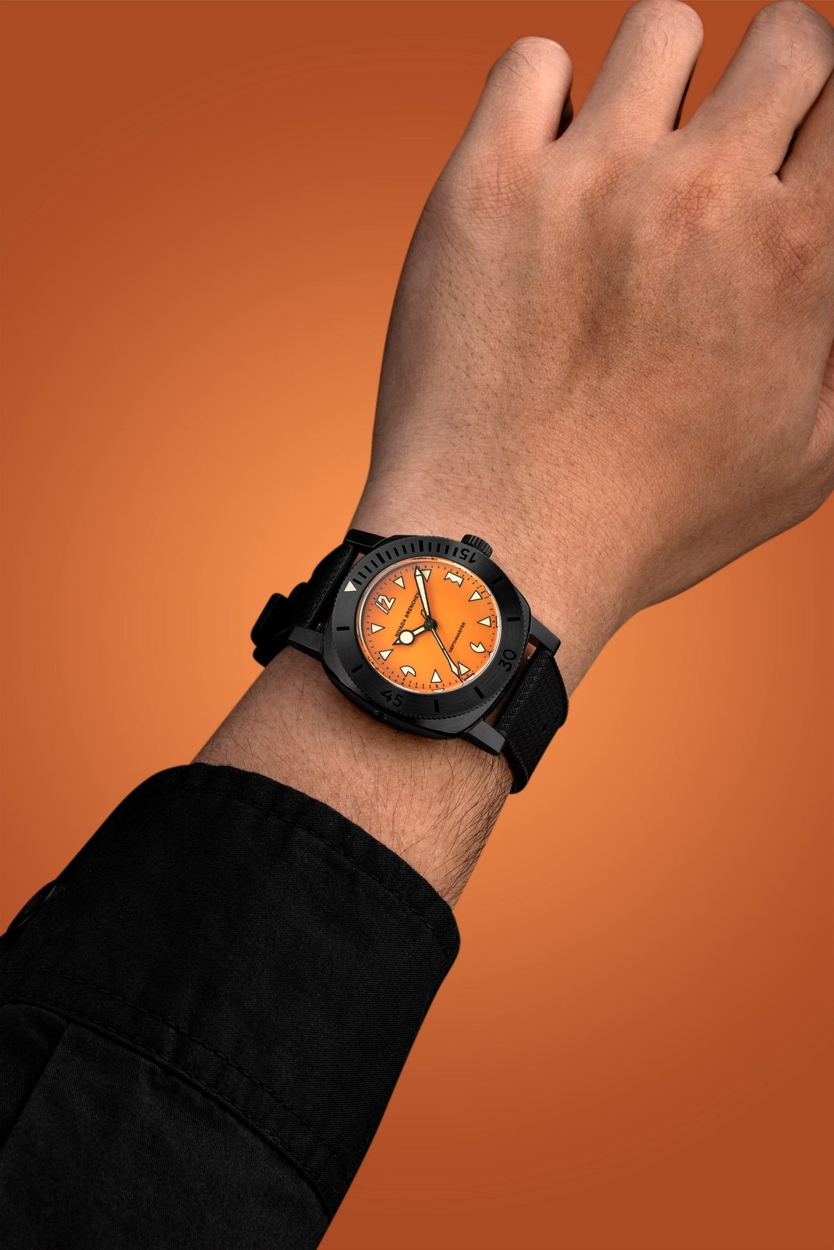 Nivada Grenchen, dòng sản phẩm Depthmaster, Ref number: 14131A, mặt số màu cam