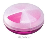 Hộp đựng thuốc loại tròn màu hồng của Nhật