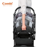 Xe đẩy Combi Sugocal Compact 4 bánh quay tự động màu đỏ