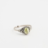 R INDI OVAL PERIDOT LIGHT GREEN STONE