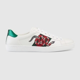 Ace Watersnake-Trimmed Appliquéd Leather Sneakers