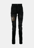 AMIRI appliqué-logo distressed-effect slim-fit jeans