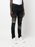 AMIRI Distressed skinny-cut Jeans