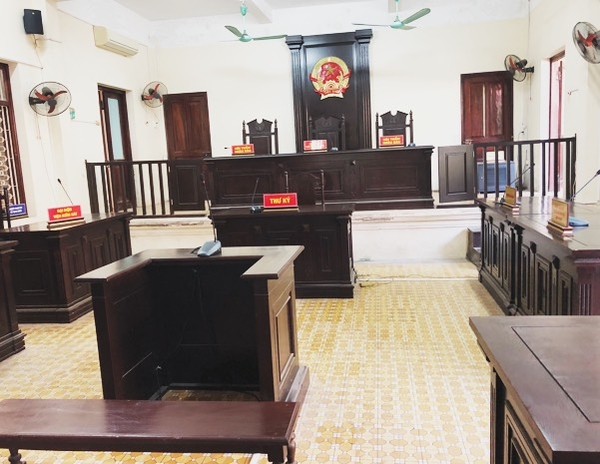 Giải quyết vụ án tranh chấp đất đai khi người bị kiện, người liên quan vắng mặt tại nơi cư trú