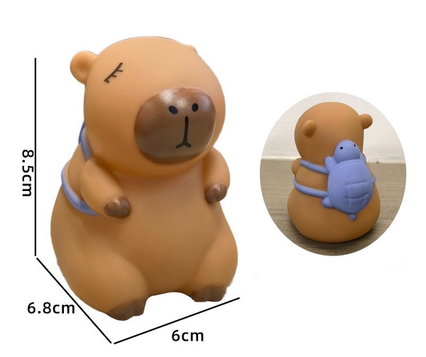 Tượng nhựa mềm-Capybara đeo balo xanh dương.