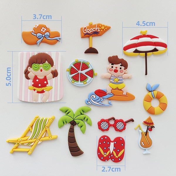 Set bé trai gái đi biển (nhựa dẻo).