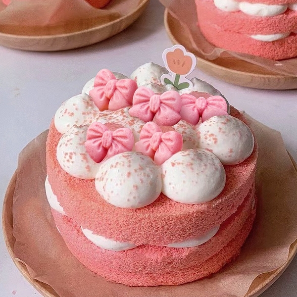 Bánh quy hình nơ màu hồng (gói 300gam).