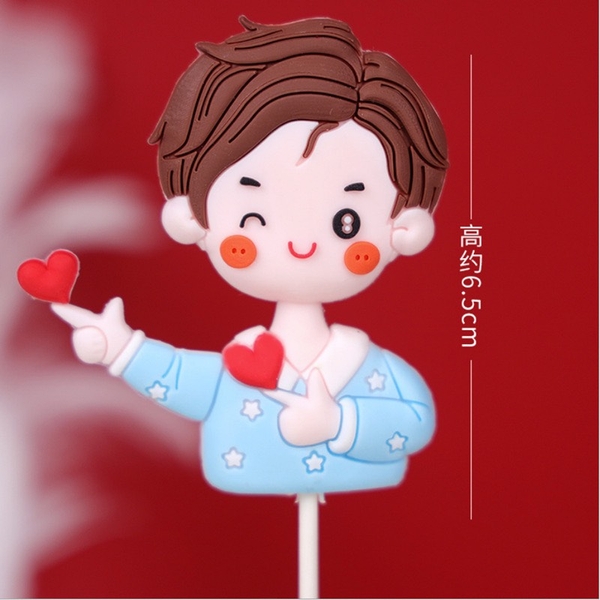 TUONG-Bé trai áo xanh thả tim (nhựa dẻo).