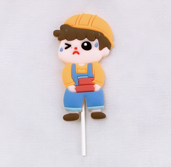 Em bé công nhân nhựa dẻo-bê gạch.