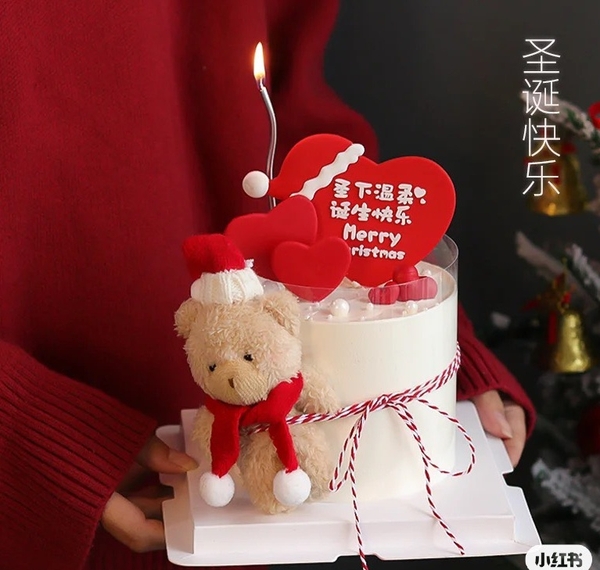 Gấu bông màu nâu gồm cả mũ và khăn (kt 7x 16cm).