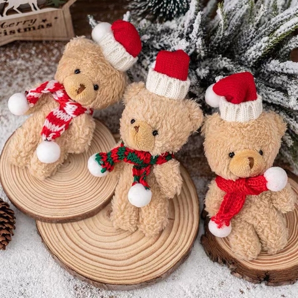 Gấu bông màu nâu gồm cả mũ và khăn (kt 7x 16cm).