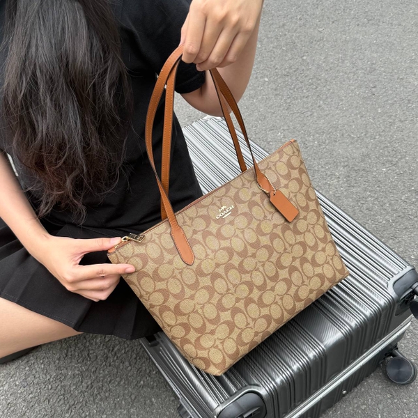 Túi Coach Zip Top Tote In Signature Canvas