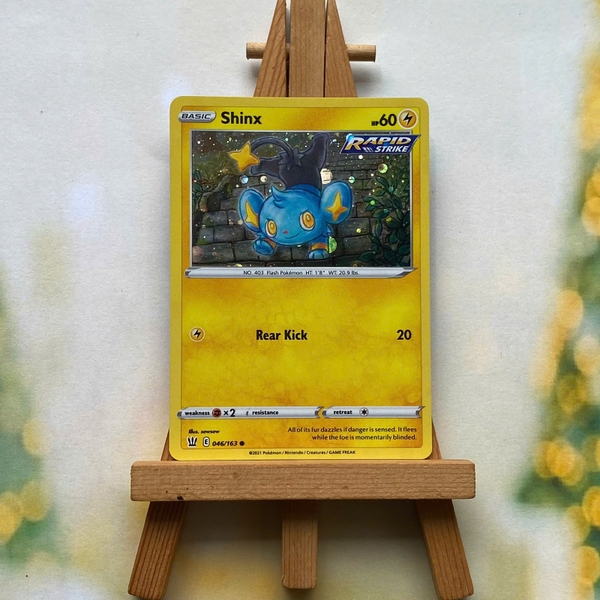 Thẻ hình Pokemon Shinx 046/163 - Lá bài lẻ SWSH05: Battle Styles Common Cosmos Holo tiếng Anh chính hãng