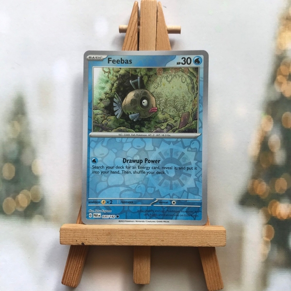 Thẻ hình Pokemon Feebas 035/182 - Lá bài lẻ Paradox Rift Common Reverse Holo tiếng Anh chính hãng
