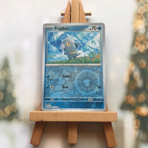 Thẻ hình Pokemon Frigibax 017/091 - Lá bài lẻ Paldean Fates Common Reverse Holo tiếng Anh chính hãng