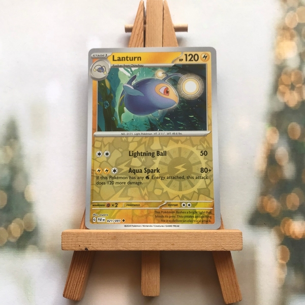 Thẻ hình Pokemon Lanturn 021/091 - Lá bài lẻ Paldean Fates Uncommon Reverse Holo tiếng Anh chính hãng