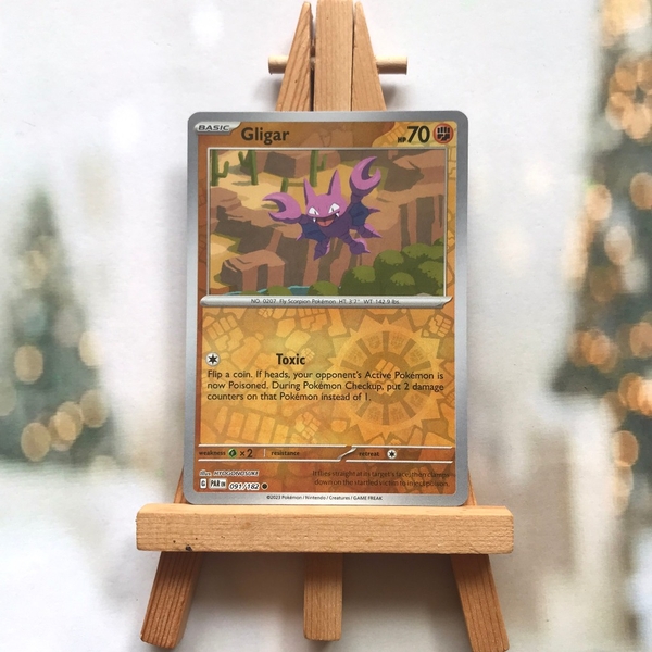 Thẻ hình Pokemon Gligar 091/182 - Lá bài lẻ Paldean Fates Common Reverse Holo tiếng Anh chính hãng