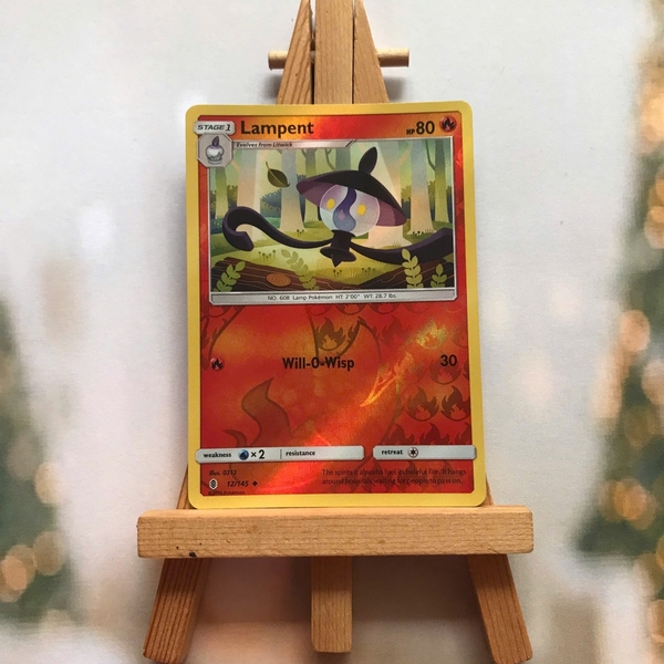 Thẻ hình Pokemon Lampent 12/145 - Lá bài lẻ Guardians Rising Uncommon Reverse Holo tiếng Anh chính hãng