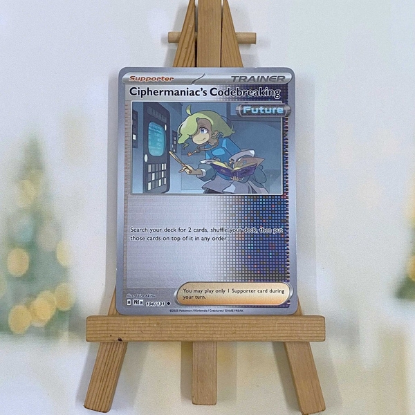 Thẻ hình Pokemon Ciphermaniac's Codebreaking 104/131 - Lá bài lẻ Prismatic Evolutions Uncommon Reverse Holo tiếng Anh chính hãng