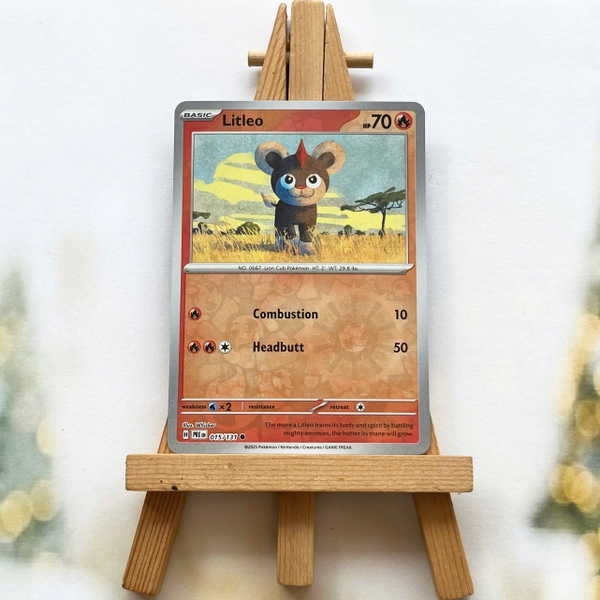 Thẻ hình Pokemon Litleo 015/131 - Lá bài lẻ Prismatic Evolutions Common Reverse Holo tiếng Anh chính hãng
