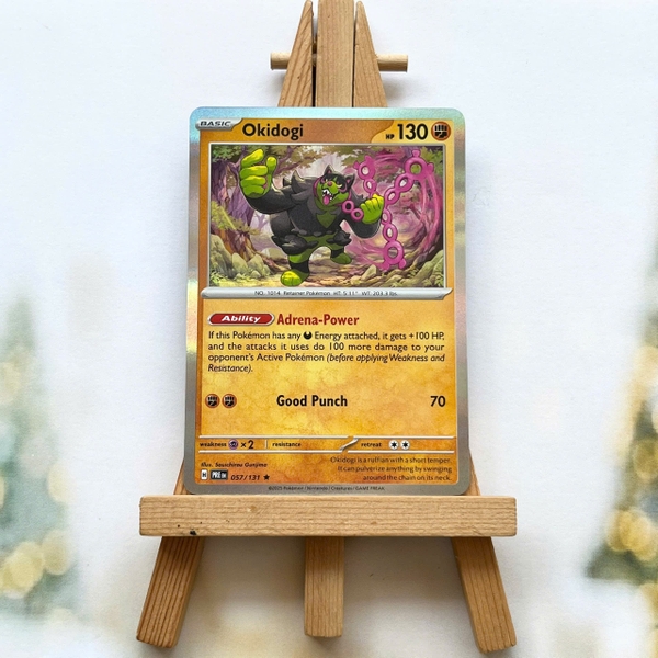 Thẻ hình Pokemon Okidogi 057/131 - Lá bài lẻ Prismatic Evolutions Rare Reverse Holo tiếng Anh chính hãng ảnh 2