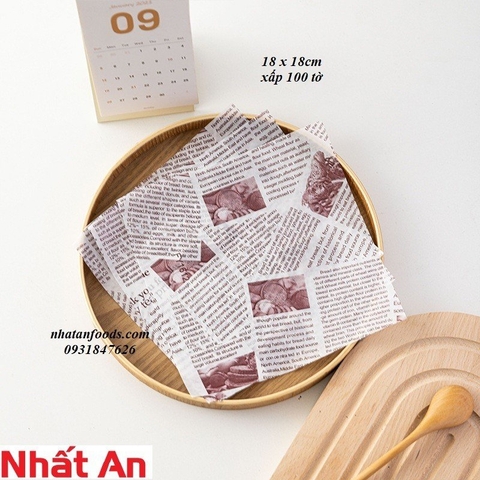 Giấy lót hộp bento / bã mía hình giấy báo (18x18cm) - xấp 100 tờ