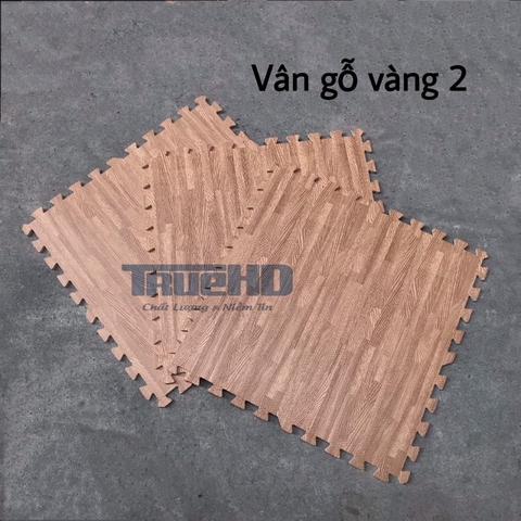 Xốp trải sàn vân gỗ vàng đậm 60x60 cm