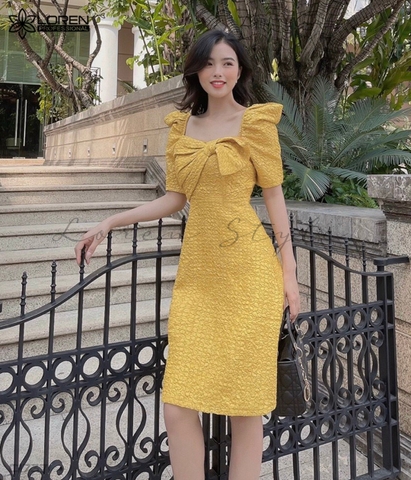 Đầm gấm xòe nơ ngực vàng C1737