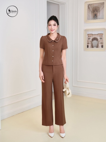 Áo sơ mi cổ sen phối viền đính hoa màu vàng