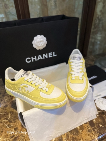 Chanel white and yellow sneakers