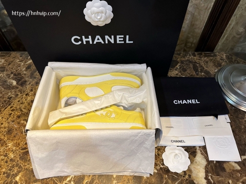 Chanel white and yellow sneakers