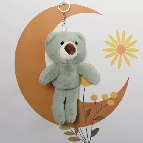 Móc khóa bông gấu chân dài QĐ