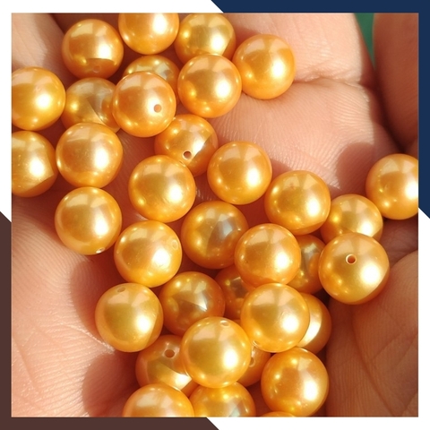 Viên ngọc trai vàng nuôi nước ngọt thật tự nhiên 8mm - 9mm tròn xoe, độ bóng 5A không vết sinh trưởng.