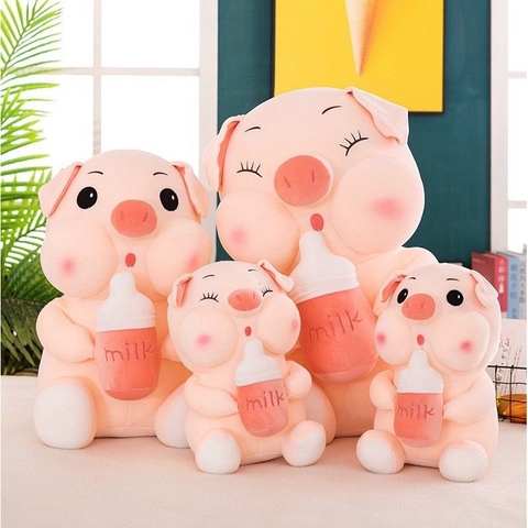 Gấu bông heo ôm bình sữa siêu dễ thương