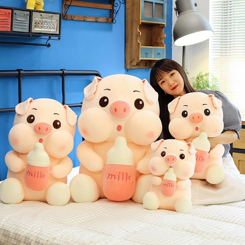 Gấu bông heo ôm bình sữa siêu dễ thương