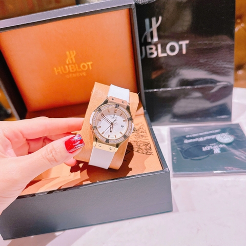 Hublot Geneve |Nữ Giới |Rose Gold |Đính Đá |Dây Silicone Trắng |Máy Pin (Máy Quartz) |Size 34mm