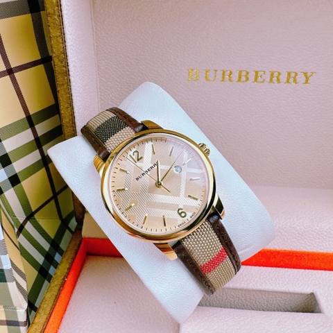 Burberry The Classic Round |Nữ Giới |Vàng Gold |Dây Vải Bọc Da Nâu |Máy Pin (Quartz) |Size 32mm
