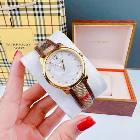 Burberry The Classic |Nữ Giới |Vàng Gold |Dây Vải Bọc Da Nâu |Máy Pin (Quartz) |Size 32mm
