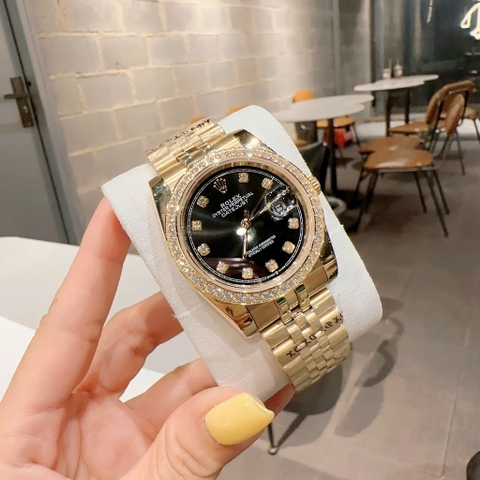 Rolex Đính Đá |Cặp Đôi |Mặt Đen |Dây Kim Loại Vàng Gold |Máy Pin (Máy Quartz) |Size 36x31mm